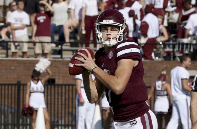 Mississippi State quarterback Nick Fitzgerald (7) prepares to pass during the first half of their NCAA college football game against Samford in Starkville, Miss., Saturday, Oct. 29, 2016. 