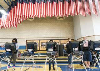 Voters cast their ballots on Election Day at the Cheyenne High School polling station in North Las Vegas, Tuesday, Nov. 8, 2016.
