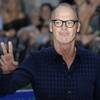 Actor Michael Keaton poses for photographers upon arrival at the world premiere of the film "The Beatles, Eight Days a Week" in London on Sept. 15.