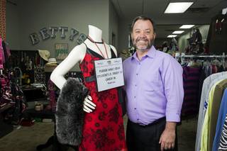 Patrick Spargur, co-founder of Project 150, poses in Betty's Boutique at the Brady Caipa Volunteer & Distribution Center Thursday, Nov. 10, 2016. Project 150 is a nonprofit organization created to help homeless, displaced and disadvantaged High School students, Spargur said.