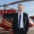 Geoff Edlund, President of Papillon Grand Canyon Helicopters stands on the tarmac in Boulder City, Nev. on Nov. 9, 2016.