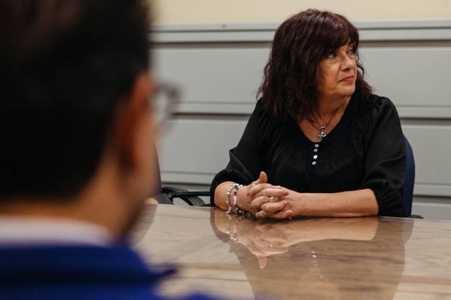 Parent Lisa Mayo-Deriso speaks with a small group at Bonanza High School in Las Vegas, Nev. on Nov. 17, 2016. Bonanza is in the process of conducting an election for its School Organization Team, a parent/teacher council that will have a major say in the day-to-day running of school.