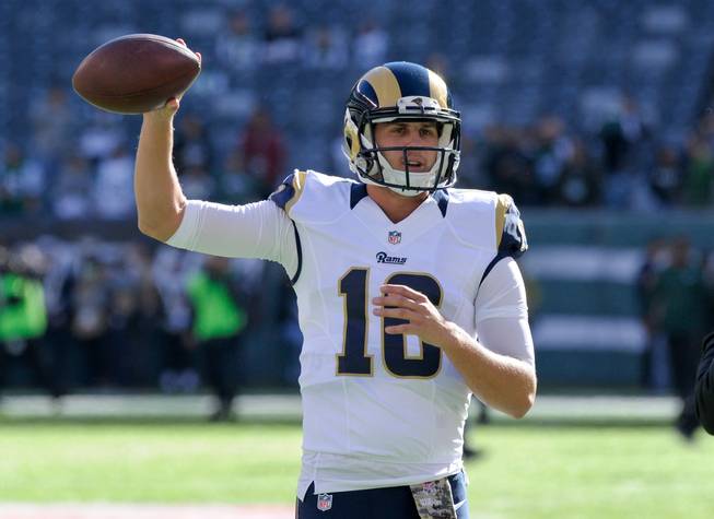 Los Angeles Rams quarterback Jared Goff warms up before an NFL game Nov. 13, 2016, against the New York Jets in East Rutherford, N.J. A person with knowledge of the decision tells The Associated Press that Goff will make his NFL debut Sunday when the No. 1 pick starts for the Los Angeles Rams.