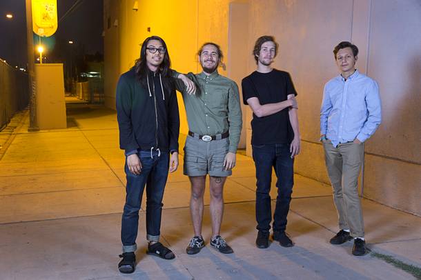 Members of the band Alaska pose by the Western Hotel in downtown Las Vegas, Nov. 20, 2016. From left are: Tyler Kawada, bass/vocals, Joel Kirschenbaum, guitar/vocals, Nick Strader, drums, and Cody Furin, guitar.
