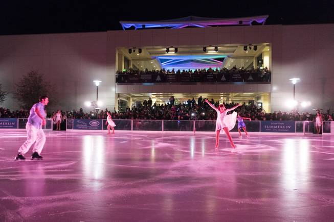 Ice skaters perform during the Downtown Summerlin Holiday Parade which included the tree lighting celebration, Friday, Nov. 18, 2016.