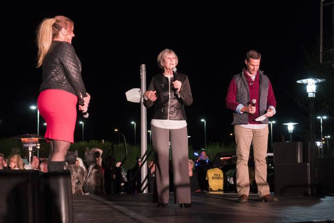 Clark County Commissioner Susan Brager, center, welcomes the crowd during the Downtown Summerlin Holiday Parade which included the tree lighting celebration, Friday, Nov. 18, 2016.