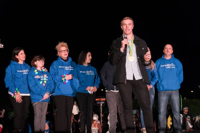 BMX Olympic gold medal winner Connor Fields addresses the crowd during the Downtown Summerlin Holiday Parade which included the tree lighting celebration, Friday, Nov. 18, 2016.