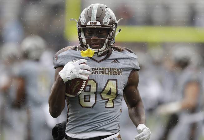 Western Michigan wide receiver Corey Davis runs during warmups before the first half of a college football game against Buffalo , Saturday, Nov. 19, 2016 in Kalamazoo, Mich. 