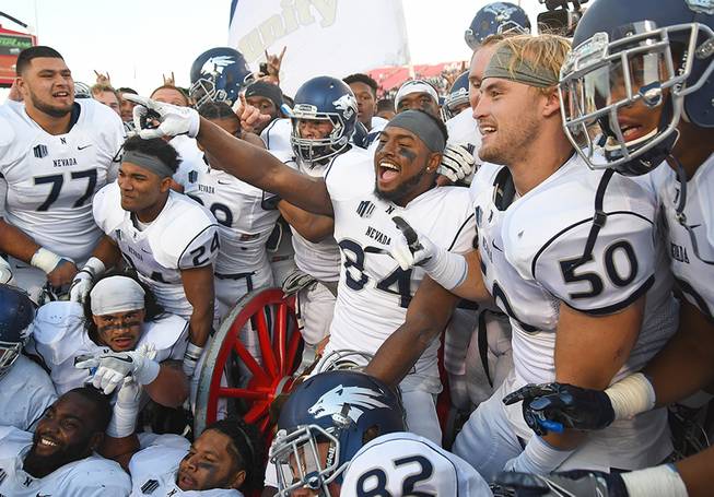 Reno Wolfpack wide receiver Jericho Richardson (84) celebrates with team ...