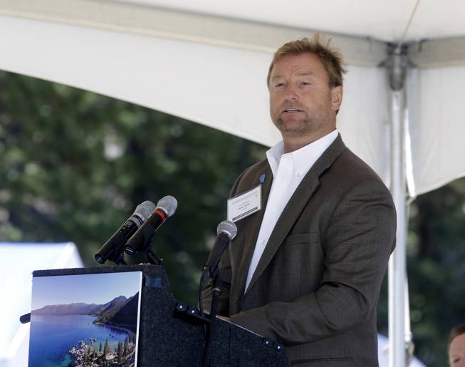 U.S. Sen. Dean Heller, R-Nev., speaks Aug. 24, 2015, at the 19th Annual Lake Tahoe Summit at Zephyr Cove, in South Lake Tahoe. The women's rights group UltraViolet ran a full-page ad in the Reno Gazette-Journal last week accusing Heller of doing nothing when president-elect Donald Trump named Steve Bannon as chief White House strategist. The group acknowledges Heller can't directly block Trump's adviser choice but says he could refuse to approve other Trump nominees until Trump boots Bannon.