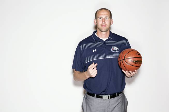 Noah Hartsock is the boys' basketball coach at Centennial High School. He played collegiately at BYU.