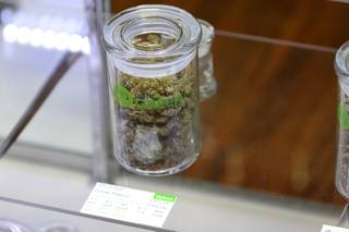 Strands of marijuana flower seen at Pure Green Marijuana Dispensary in Portland, Oregon on Tuesday, Nov. 29, 2016.