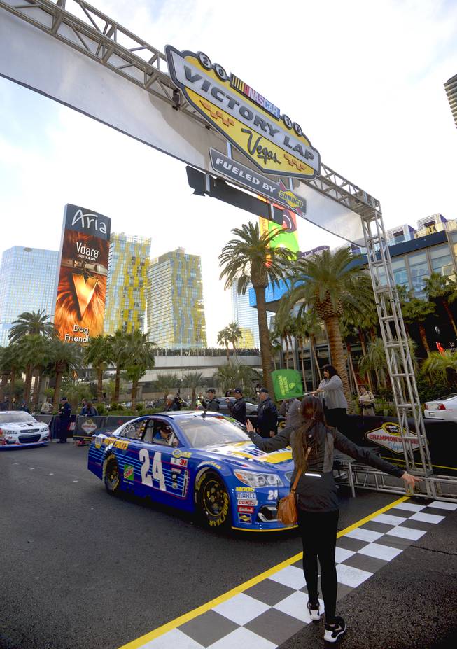 Jeff Gordon gets the green flag as NASCARs Sprint Cup Series Champions shut down the Las Vegas Strip on Dec. 1 to take a victory lap and do burnouts on the famed boulevard as part of Champions Week in Las Vegas. Thursday, December 1, 2016.