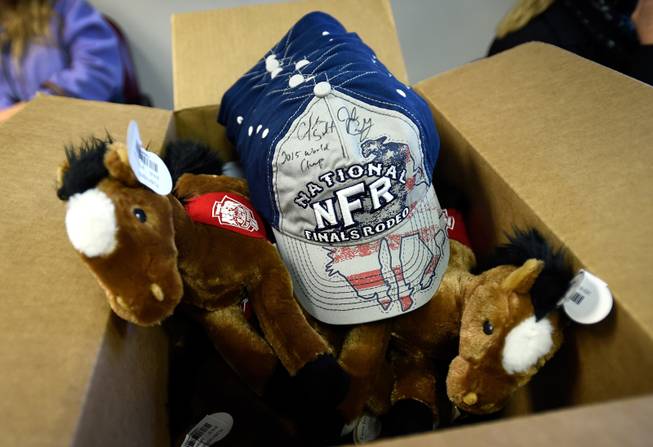 National Final Rodeo merchandise is seen during cowboy visit to Grant a Gift Autism Foundation at the UNLV Medicine Ackerman Autism Center Friday, Dec. 2, 2016, in Las Vegas.