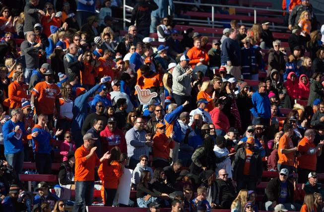 Bishop Gorman fans cheer on their team after another score over Liberty during their high school football state championship game at Sam Boyd Stadium on Saturday, Dec. 3, 2016.