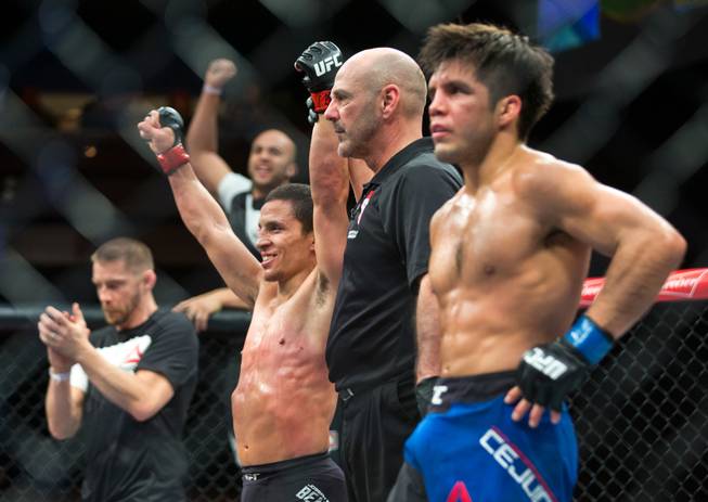 Flyweight Joseph Benavidez is announced as the winner over Henry Cejudo during their Ultimate Fighter 24 Finale fight at The Palms on Saturday, Dec. 3, 2016.