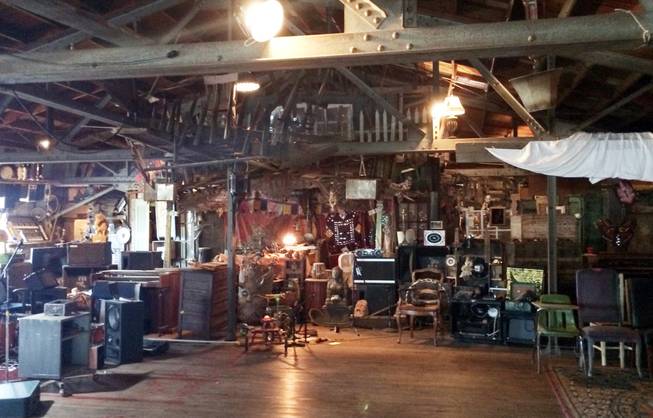 This 2014 photo taken during a tour for a potential tenant shows the interior of a portion of the Ghost Ship Warehouse in Oakland, Calif. Dozens of people died at a party after a fire that started late Friday, Dec. 2, 2016, swept through the building.