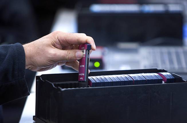 Cartridges from early going machines are shown as Clark County Election Department staff conduct an election recount of 84 precincts at a warehouse in North Las Vegas Monday, Dec. 5, 2016. The recount was requested and is being paid for by former presidential candidate Roque "Rocky" De La Fuente, a California businessman.