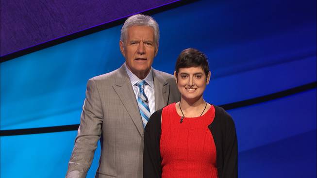 In this Aug. 31, 2016, photo provided by Jeopardy Productions, Inc., Cindy Stowell, right, appears on the "Jeopardy!" set with Alex Trebek in Culver City, Calif.