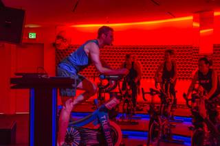 Cycle Instructor Patrick Leahy leads a class at The Ride cycling studio, Thursday, Dec 15, 2016.