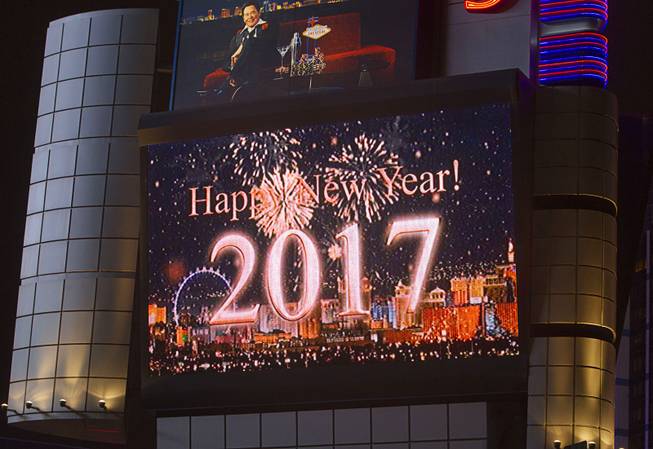 The marquee sign at Bally's is shown just after midnight on the Las Vegas Strip Sunday, Jan. 1, 2016.