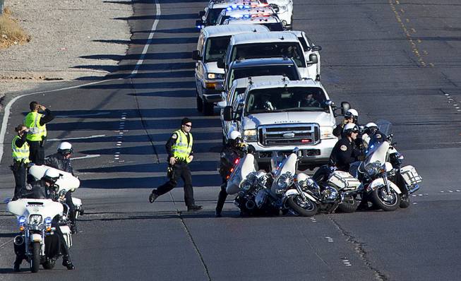 Henderson Police motorcycle officers get tangled up in the back of a procession as they leave Central Christian Church after a memorial service for North Las Vegas Police Detective Chad Parque, 32, in Henderson Tuesday, Jan. 17, 2017. Parque died from injuries sustained in a Jan. 6 head-on collision while on duty.