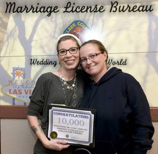 Clark County Clerk's Marriage License Bureau issues their 10,000th same-sex marriage license to Amanda Falzone and Jennifer Dickerson of Colorado Springs, Colorado at the Clark County Courthouse in downtown Las Vegas. In celebration of this milestone, local businesses have donated many great wedding presents for the 10,000th same-sex couple  including a two-night stay and dinner at Mandalay Bay, passes to the High Roller observation wheel at The LINQ Promenade, flowers, professional photographs and a wedding ceremony.  Friday, January 20, 2017. CREDIT: Glenn Pinkerton/Las Vegas News Bureau