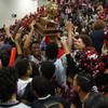 Las Vegas High School Wildcats celebrate with the V Game trophy after beating Valley High School in the "V Game" at Las Vegas High Tuesday, Jan. 31, 2017. 