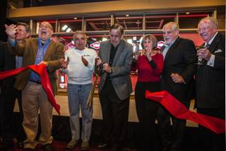 Legendary broadcaster Brent Musburger cuts a ribbon joined by other invited guests as South Point Hotel and VSiN (Vegas Stats and Information Network) host a special ribbon cutting ceremony revealing the custom-built sports broadcasting studio and new home to on Friday, Feb. 3, 2017.
