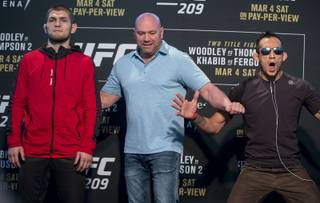 Lightweights Khabib Nurmagomedov and Tony Ferguson are shown with UFC President Dana White after the UFC 209 fighters spoke to media in the T-Mobile Arena on Thursday, March 2, 2017.