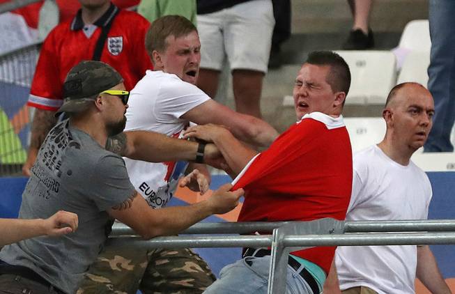 Russian fans attack England fan