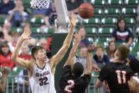 Gonzaga forward Zach Collins blocks a shot by Pacific guard T.J. Wallace during their West Coast Conference tournament game Saturday, March 4, 2016, at the Orleans Arena. Gonzaga won the game 82-50.