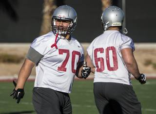 UNLV offensive lineman Sid Acosta (70) looks to the field as the football team conducts their first spring practice of the year on Wednesday, March 1, 2017.