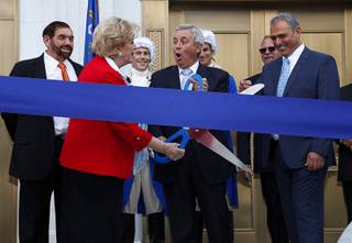 Las Vegas Mayor Carolyn Goodman and Justice James Hardesty prepare to cut a ribbon during a grand opening ceremony for the Nevada Supreme Court and Nevada Court of Appeals courthouse in downtown Las Vegas Monday, March 27, 2017. Also pictured are Chief Justice Michael Cherry, left, and builder Yohan Lowie, right, CEO of EHB Companies.