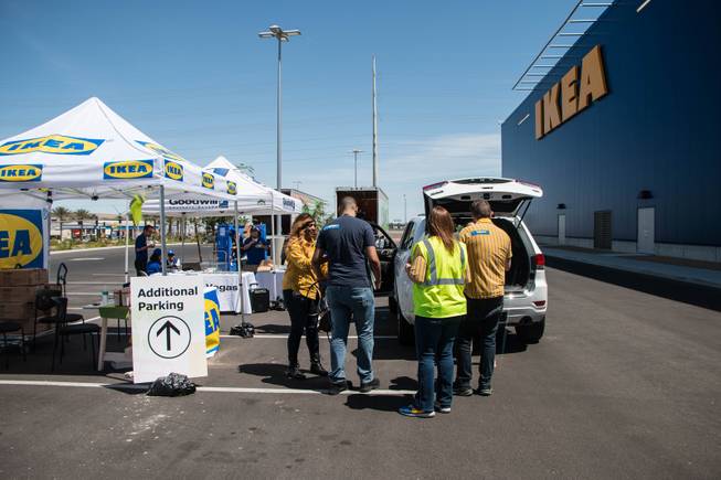 People gather at a popup donation center outside of Ikea, with the collected furniture going to Goodwill of Southern Nevada. 