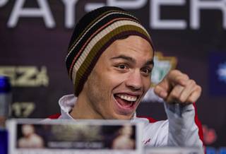 Julio Cesar Chavez Jr. looks to his support group during his official press conference with opponent Canelo Alvarez in the Ka Theatre at the MGM Grand on Wednesday, May 3, 2017.
