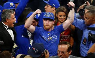 Mexican boxer Canelo Alvarez celebrates his unanimous decision victory over Julio Cesar Chavez Jr. after their fight at T-Mobile Arena Saturday, May 6, 2017.