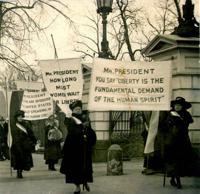 Members of the National Woman's Party demonstrate at the White House in 1918, demanding voting rights. Suffrage was granted nationwide in 1920.