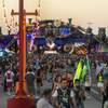 The crowd begins to thicken up on the midway during the opening night of EDC Las Vegas 2017 at the Las Vegas Motor Speedway on Friday, June 16, 2017.