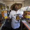 Bonanza High football coach Dion Lee toils at a fireworks booth at Buffalo Drive and Lake Mead Boulevard Monday, July 3, 2017. Sales from the fundraiser will boost Lee's efforts to raise $100,000 for the football program.