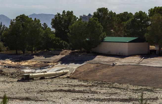 One of the empty water features about the shuttered Badlands Golf Course with dead greens and overgrowth in Summerlin on Saturday, August 12, 2017.