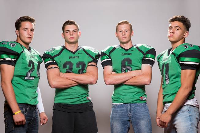Members of the Virgin Valley High School football team, from left, Cresent Crandall, Jayden Perkins, Cade Anderson and Timmy Moeai pose for a portrait at the Las Vegas Sun's high school football media day August 2, 2017, at the South Point.
