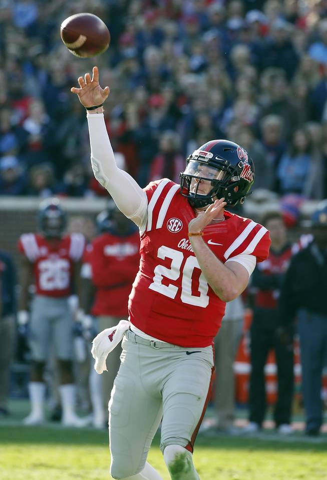Mississippi quarterback Shea Patterson (20) passes against Mississippi State in the first half of an NCAA college football game in Oxford, Miss., Saturday, Nov. 26, 2016.