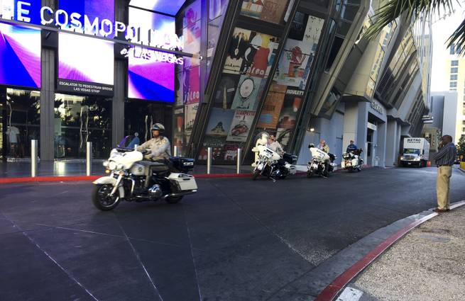 Metro Police Officers guard the Cosmopolitan Hotel and Casino following a mass shooting on the Las Vegas Strip, which left 58 people dead and over 500 injured, Monday, Oct. 2, 2017.