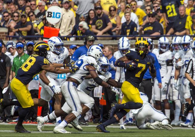 Michigan wide receiver Tarik Black (7) rushes after a reception in the fourth quarter of an NCAA college football game against Air Force in Ann Arbor, Mich., Saturday, Sept. 16, 2017. Michigan won 29-13. 