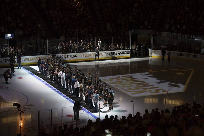 First responders and medical personnel involved in the October 1st tragedy are introduced and escorted by the Vegas Golden Knights before the Knights home opener against the Arizona Coyotes Tuesday, Oct. 10, 2017, at the T-Mobile Arena. The Knights won 5-2 to extend their winning streak to 3-0.