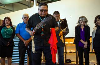 Chris Spotted eagle gives a blessing flanked by the tribal council as the Las Vegas Paiute Tribe opens its Nuwu Cannabis Marketplace for VIP media and politicians for an exclusive look at the mega dispensary before its Monday opening on Saturday, October 14, 2017.