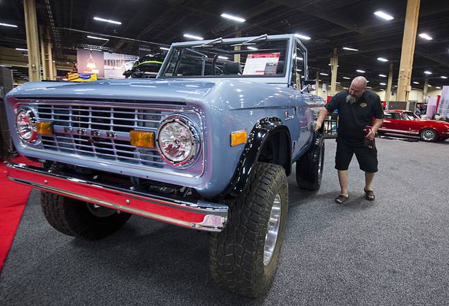 Larry Bertels, of Gateway Bronco, details a Ford Bronco Restored Fuelie before the 10th annual Barrett-Jackson Las Vegas classic car auction at the Mandalay Bay Convention Center Wednesday, Oct. 18, 2017. The Illinois-based company specializes in restoring and modernizing classic Ford Broncos.