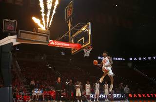 Tervell Beck (14) competes in a dunk contest during the UNLV basketball Scarlet & Gray Showcase at the Thomas & Mack Center in Las Vegas Wednesday, Oct. 18, 2017. STEVE MARCUS