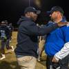 Canyon Springs head coach Gus McNair and Basic head Coach Jeffrey Cahill come together for a moment after their playoff game on Friday, Nov. 3, 2017.
